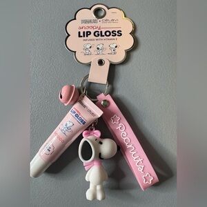 Peanuts x celavi Pink Snoopy Lip Gloss Keychain infused with Vitamin E plum